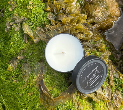 Do you believe in destiny candle with a marine scent and background in Cruden Bay beach